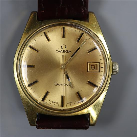 A gentlemans early 1970s gold plated and steel Omega manual wind wrist watch with date aperture, movement c.613.